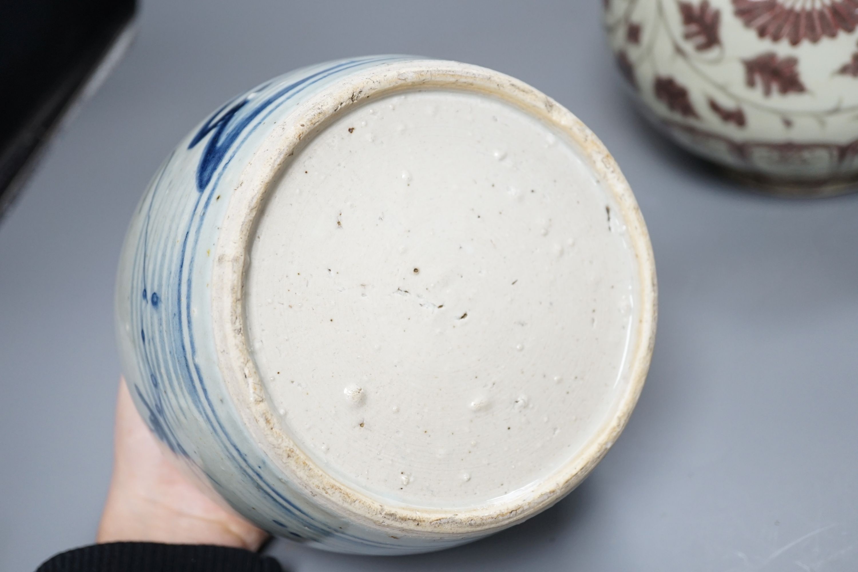 A Chinese red underglaze baluster jar, 32cm, and a 19th century Chinese blue and white ginger jar